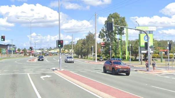 Oxley Dr at Biggera Waters, outside busy Harbour Town shopping centre.