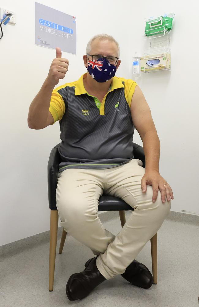 Prime Minister Scott Morrison gives the thumbs up after receiving a COVID-19 vaccination at Castle Hill Medical Centre yesterday. Picture: Mark Evans/Getty Images