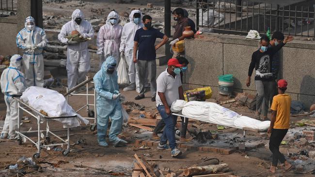 Bodies of COVID-19 victims at a cremation ground in New Delhi. Picture: AFP