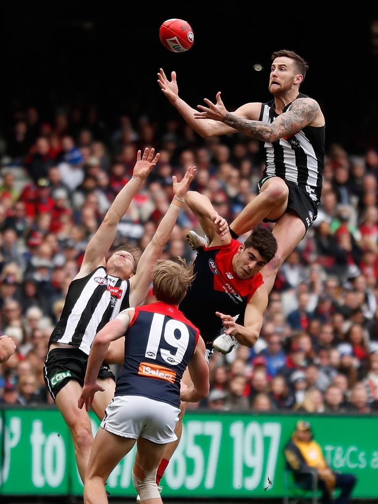 Jeremy Howe over Christian Petracca. Picture: Getty Images