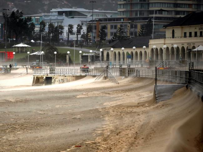 A severe storm still lashing Sydney caused the sand to shift up Bondi Beach. Picture: John Grainger