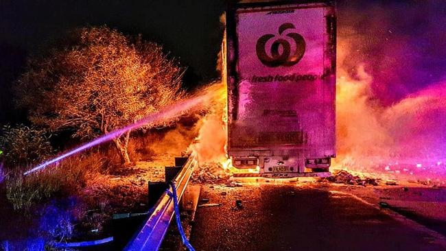 Emergency services work to contain the blaze on M5 in the early hours of this morning. Picture: Fire and Rescue NSW St Andrews