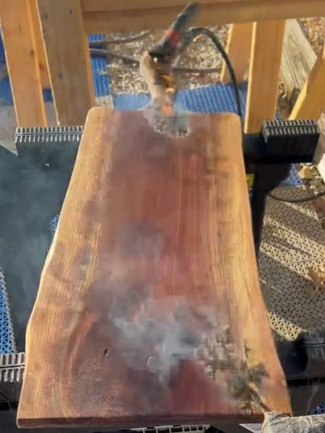 A US couple has died while attempting the ‘highly dangerous’ wood-burning technique. Picture: TikTok