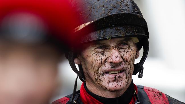 Jockey Robert Thompson was likely looking at a few horse bottoms to cop this kickback of mud. Picture: Jenny Evans