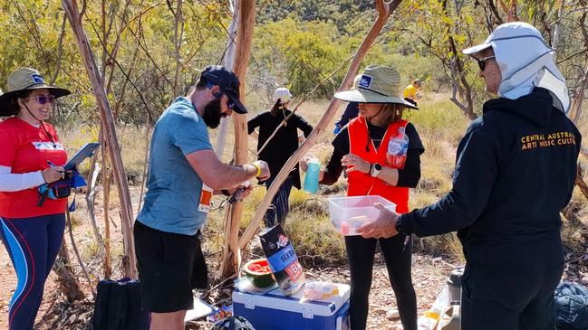 Runners competing in the 231km Sonder Monster come through aid stations at Redbank Gorge after summiting Mt Sonder at the 2023 West Macs Monster. Picture: West Macs Monster