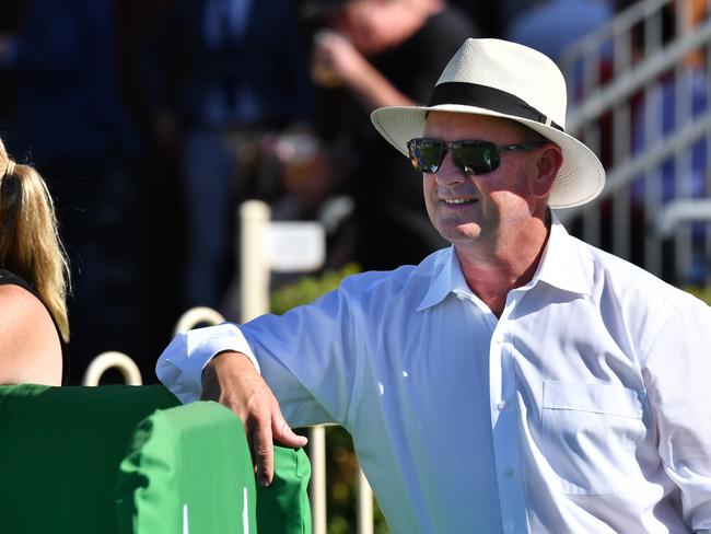 Trainer, Toby Edmonds is seen after his horse Curdled won race 6, the Canadian Club Handicap, during Cascade Race Day at Doomben Racecourse in Brisbane, Saturday, February 9, 2019. (AAP Image/Darren England)