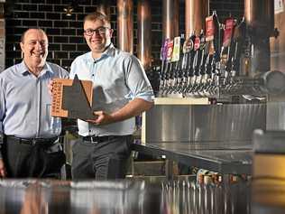 CHEERS: PA Hotel general manager Peter Coultas and operations manager Tim Rule celebrate the venue's latest success in the Queensland Hotels Association Awards. Picture: Cordell Richardson