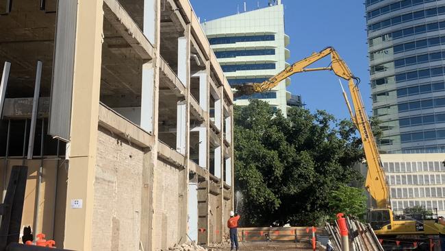 Demolition of the Chan Building is finally under way in Darwin to make way for State Square redevelopment. Picture: Katrina Bridgeford