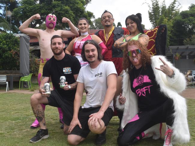 Promoting the Pro Wrestling Australia 'Rampage' event at the Petersham Bowling Club are (Back, from left) Hot Fudge, 'Designer Doll' Frankie B, 'The Dragonheart' Kai Drake and 'Human Weapon' Charli Evans. (Front, from left) Jeremy Cotterill (Young Henrys), Carl Manwarring (Petersham Bowling Club) and Digby 'Big Red Fire Truck' Robinson . Picture: Sean Teuma