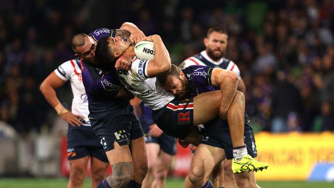 Nelson Asofa-Solomona grabs Joseph Suaalii high. NRL Imagery