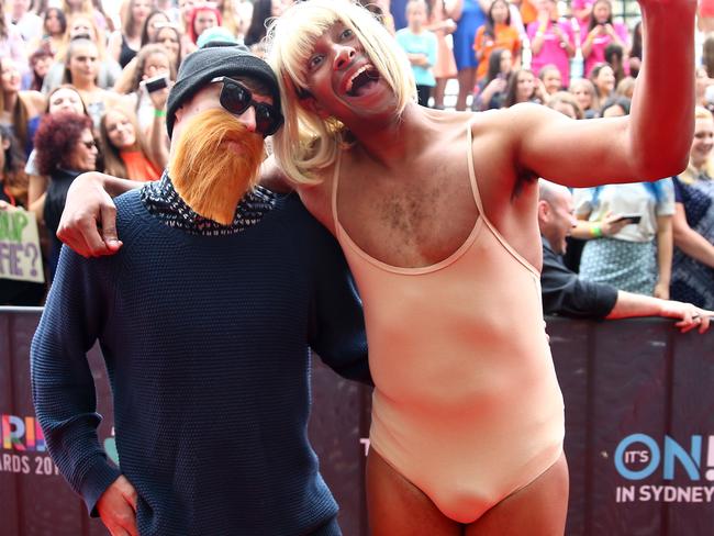 No one was looking at Matt Okine’s lovely blonde wig on the ARIAs red carpet.