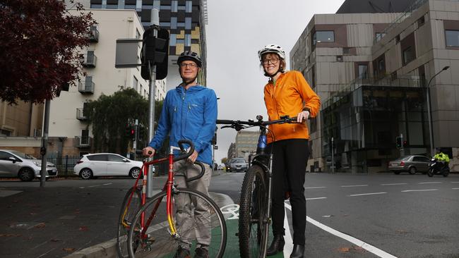 Doctor Dominic Lang and Doctor Anna Johnston who ride their bikes to work. New report on Collins St released. Picture: Nikki Davis-Jones