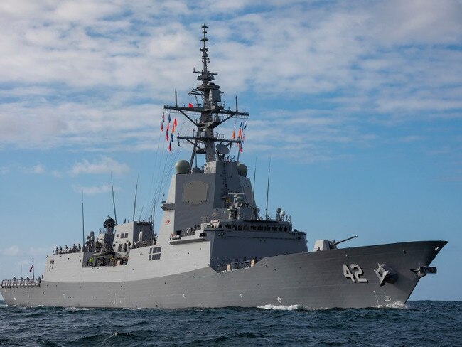 Air Warfare Destroyer NUSHIP Sydney sails through Sydney Heads and enters her namesake harbour for the first time on 27 March 2020. *** Local Caption *** NUSHIP Sydney arrived in her namesake city for the first time on 27 March 2020, 36 years to the day since the last warship to carry the name arrived in Sydney. The 147-metre long Air Warfare Destroyer came alongside her new homeport at Garden Island in Sydney following the transit from Osborne in South Australia where she was built. Sydney is the last of three Hobart Class vessels built for the Royal Australian Navy and is based on the Navantia F100 frigate design. She is equipped with advanced combat systems, providing the ship with the layered defensive and offensive capabilities required to counter conventional asymmetrical threats. Sydney will commission into the Royal Australian Navy in May 2020. Her sister ships Hobart and Brisbane commissioned in 2017 and 2018 respectively.