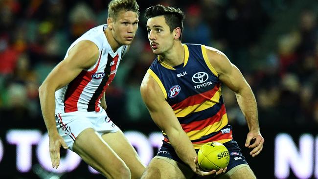 Unselfish ... Crows skipper Taylor Walker prepares to handpass. Picture: Tom Huntley