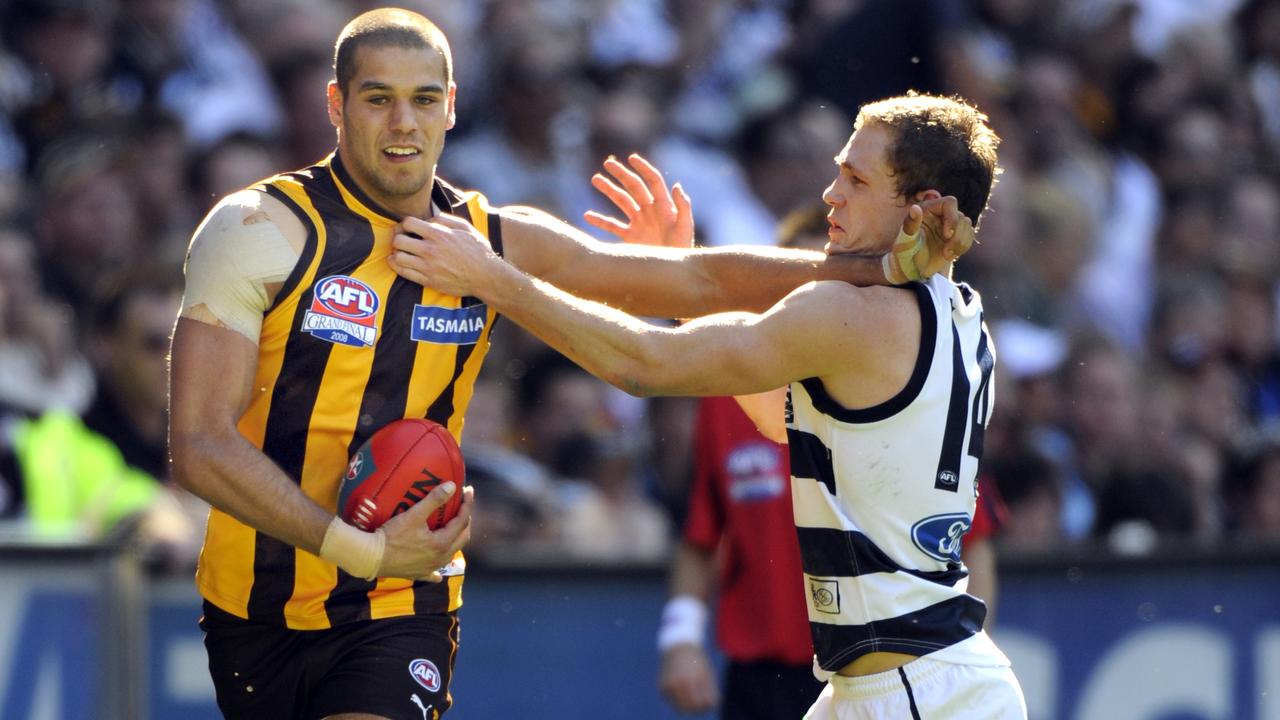 Lance Franklin fends off Joel Selwood in the 2008 Grand Final. Picture: Jay Town