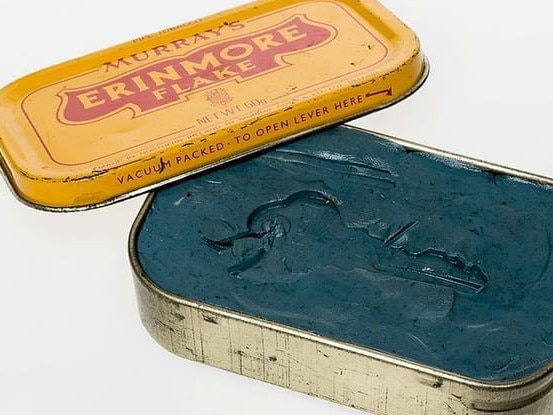 Vintage SpyGear includes this tobacco tin which concealed material for copying keys. Picture: ASIO/Instagram.