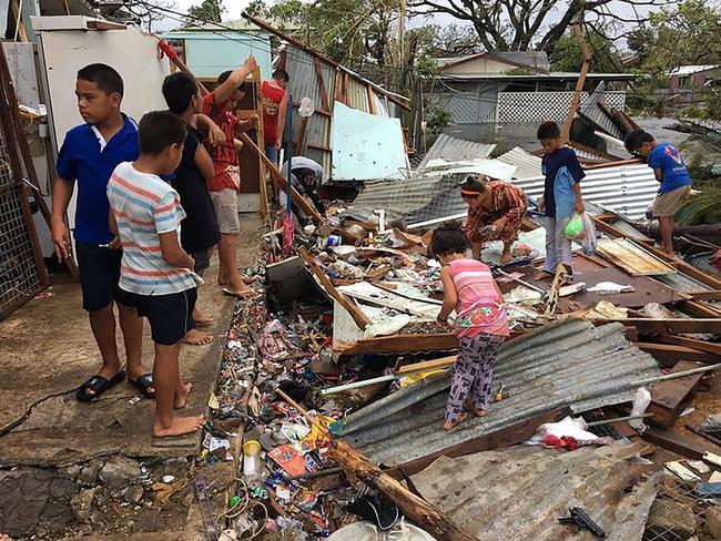 Damage in Tonga's capital of Nuku'alofa after Cyclone Gita and locals woke to scenes of devastation on February 13 after the most powerful cyclone ever recorded in that country. Picture: AFP