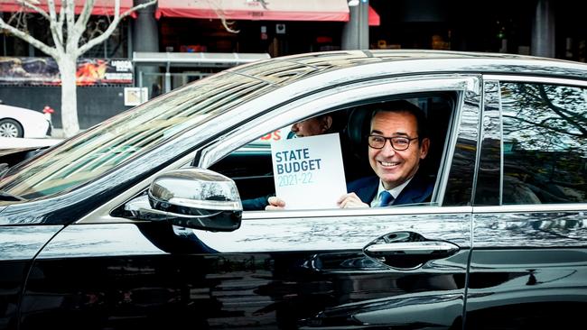 Premier Steven Marshall smiles with the 2021 budget papers. Picture: Mike Burton