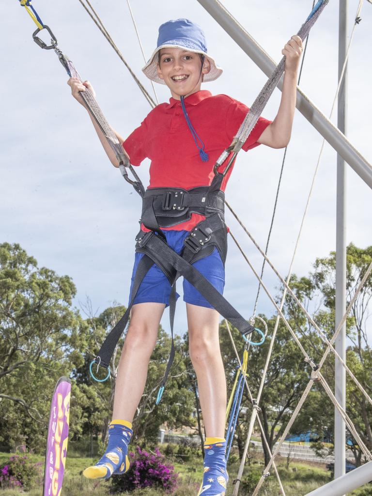 Nathan Wandel enjoys the bungee jump. Toowoomba Royal Show. Friday, March 31, 2023. Picture: Nev Madsen.