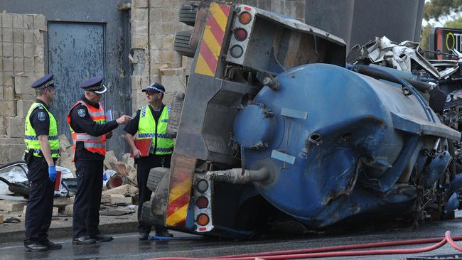 2014: Police at the scene of a truck crash at the bottom of the South Eastern Freeway. Picture: Roger Wyman