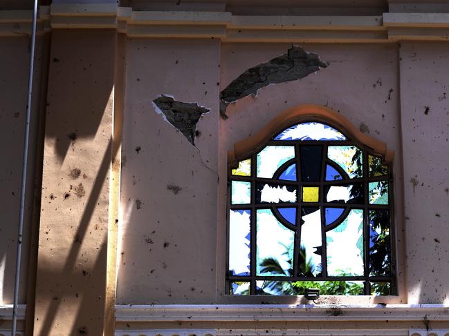 A stained-glass window stands broken at Sebastian's Church, where a suicide bomber blew himself up on Easter Sunday in Negombo, north of Colombo. Picture: AP