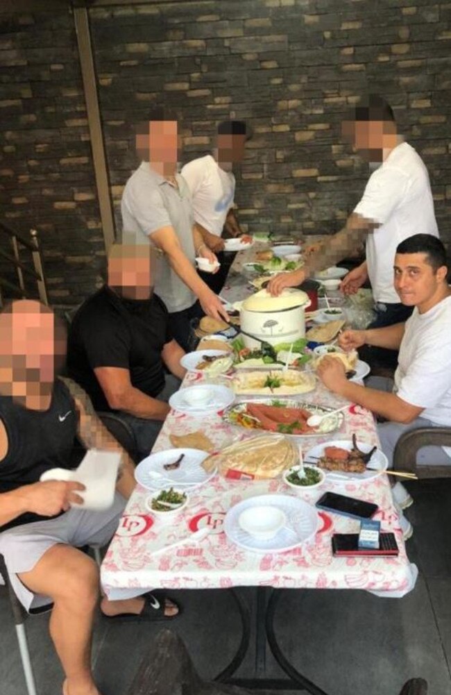 Bilal Haouchar (right, in white T-shirt, looking at camera) and friends, believed to be at a friend’s house in Lebanon.