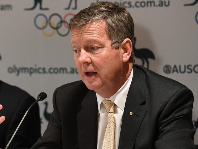Australian Olympic Committee (AOC) chief executive officer Matt Carroll (R) speaks beside AOC president John Coates during a press conference in Sydney on August 24, 2017. An independent review of the Australian Olympic Committee's workplace practices released on August 24 has revealed a dysfunctional culture out of step with the Games' ideals. / AFP PHOTO / William WEST