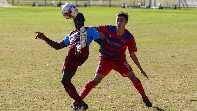 Coomera’s Ferdinand Annor (left).