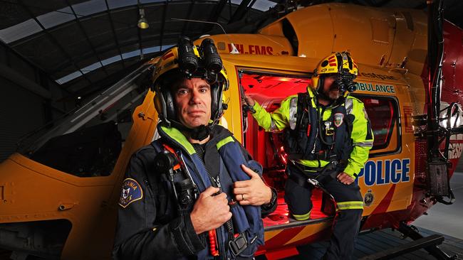 Crew members from the Westpac Rescue Helicopter first class constable, Tim Donovan and intensive care flight paramedic, James Sims show off their new night vision goggles. Picture: Zak Simmonds