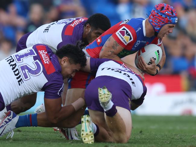 Ponga tackled by Tui Kamikamica and Eliesa Katoa on Sunday. Picture: Scott Gardiner/Getty Images