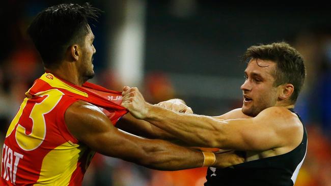 JUMPER FIGHT ... Gold Coast has won the battle to wear its red jumper in Shanghai next week when the AFL has its first premiership match in China, but Port Adelaide may not invite the Suns for a return visit. Picture: Jason O'Brien (Getty Images)