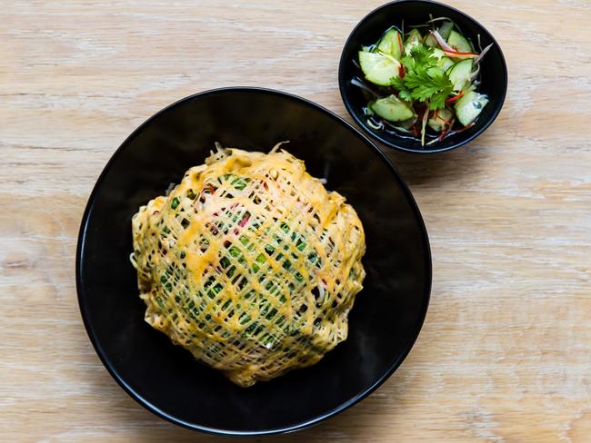 Longrain’s filled eggnet with pork, prawns, peanuts &amp; caramelised coconut.