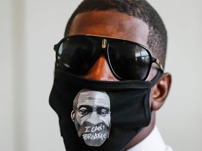 Quincy Mason Floyd, son of George Floyd, enters the church for his father's funeral. Picture: AFP