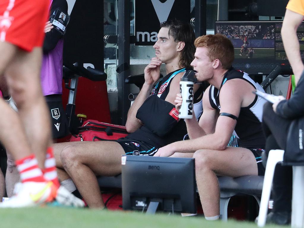 Debutant Brynn Teakle was forced to the bench with his arm in a sling. Picture: AFL Photos/Getty Images