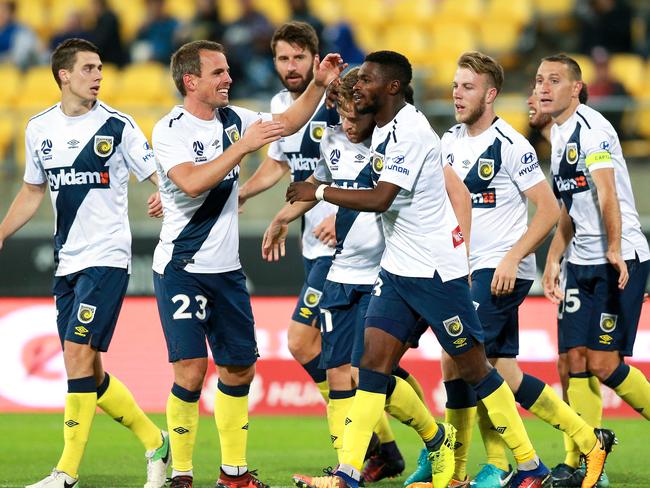 Mariners players celebrate.