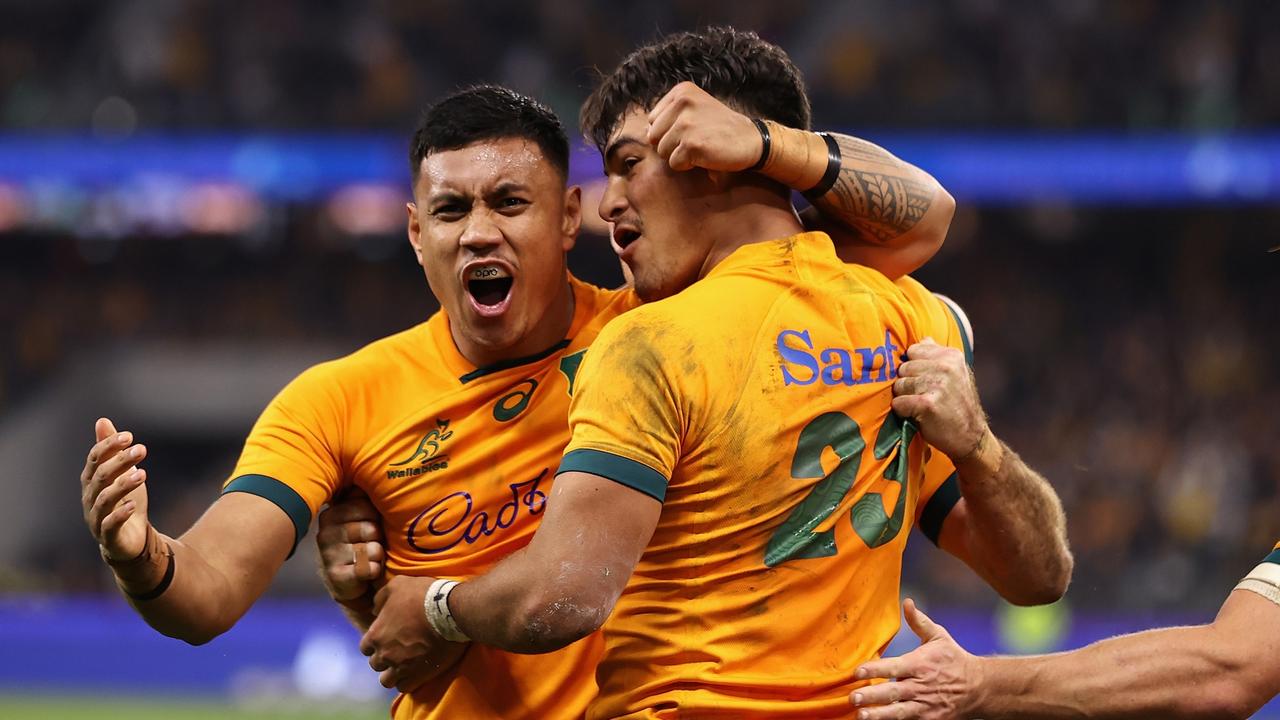 The Wallabies celebrate a try against England. Picture: Cameron Spencer/Getty Images