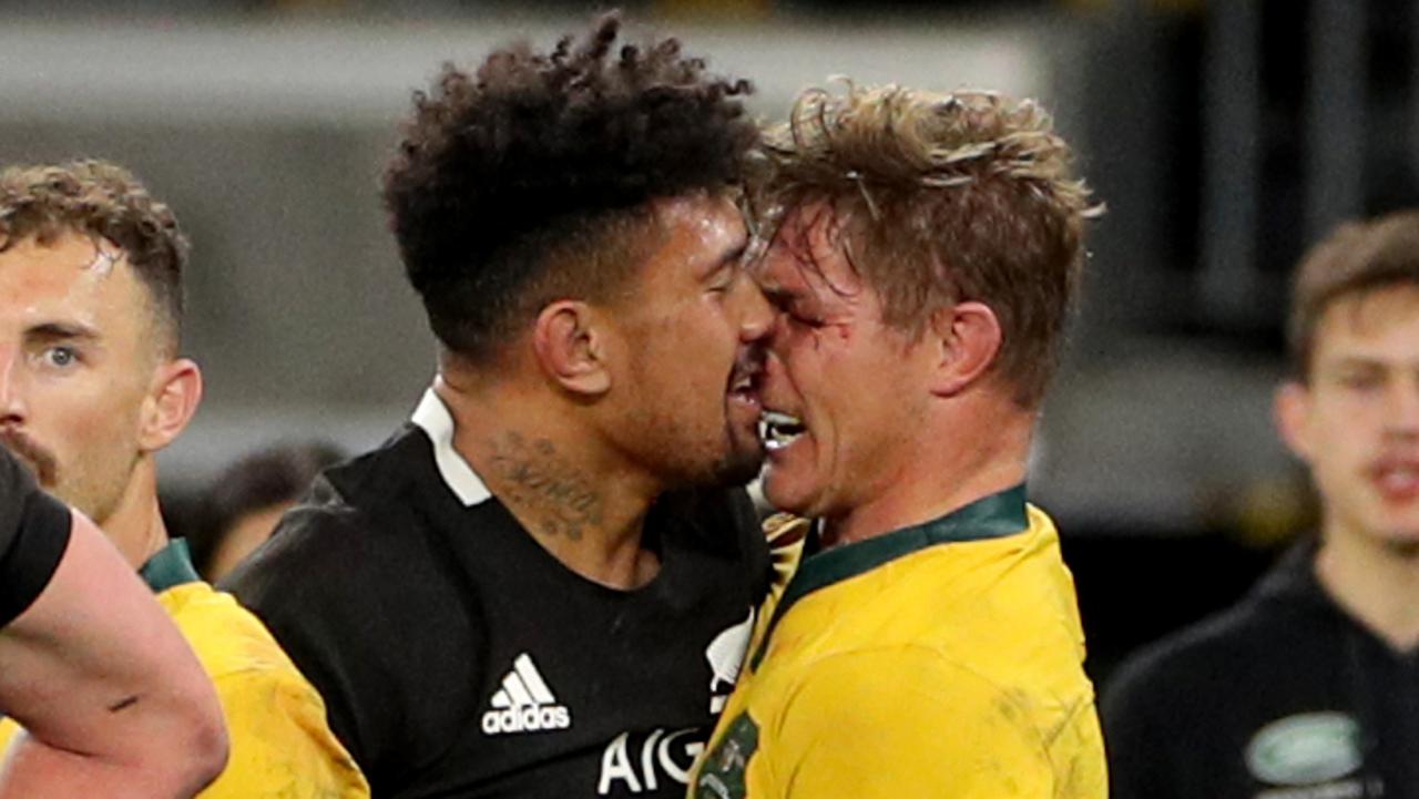 Michael Hooper of the Wallabies and Ardie Savea of the All Blacks clash.