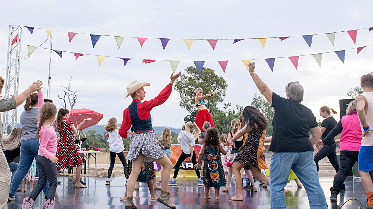 Everybody Now! Facilitators leading the crowd in dance performances at the Somerset Art Beat Festival in July.