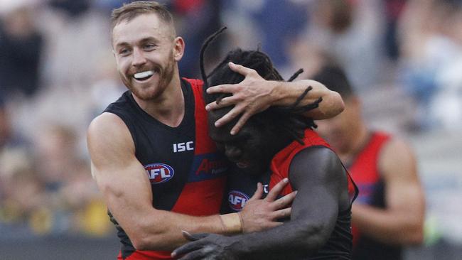 Anthony McDonald-Tipungwuti and Devon Smith of Essendon.