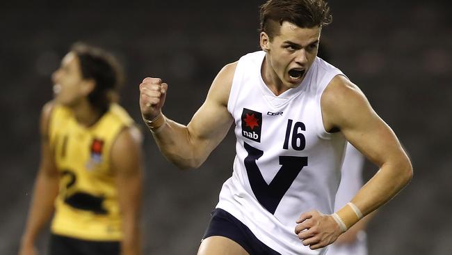 Brodie Kemp celebrates a goal for Vic Country in the under-18 championships.