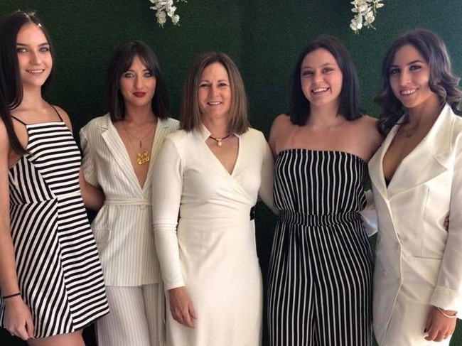 Natalie Joyce (centre) with daughters Odette, 16, Bridgette, 21, Caroline, 19, and Julia, 20. 