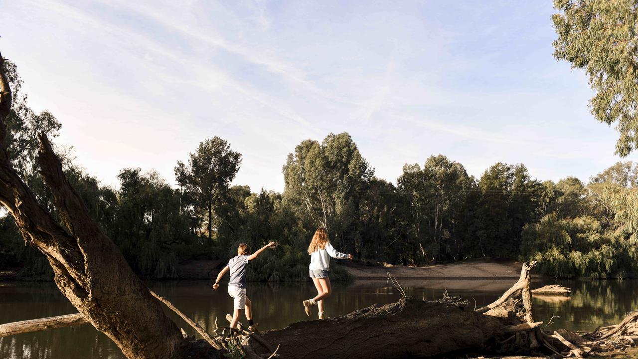 Ellie and Harry play on the river bank. Picture: Dannika Bonser