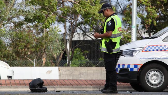 Police at the scene of a fatal accident between a motorbike and a car on Bermuda St Broadbeach Waters. Picture Glenn Hampson