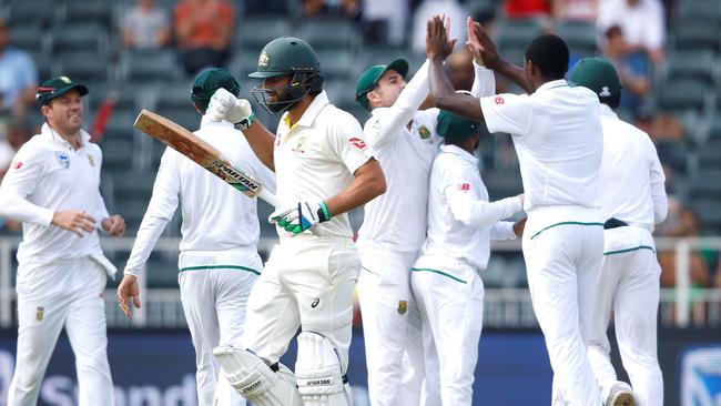 Kagiso Rabada celebrates the dismissal of Joe Burns on day two of the fourth Test.