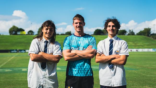 Storm NRL squad member and former Caloundra High School history teacher Chris Lewis (middle) with Caloundra High year 11 students Chase Paterson (left) and Tully McLellan. Picture: Supplied.