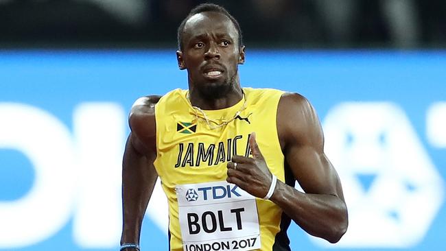 Usain Bolt during 100 metres heats at the World Athletics Championships.