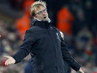 Liverpool manager Jurgen Klopp gestures on the touchline, during the English Premier League soccer match between Liverpool and Stoke City, at Anfield, in Liverpool, England, Tuesday Dec. 27, 2016. (Martin Rickett/PA via AP)