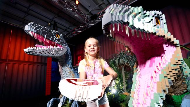 Poppi Tognini 6yrs from Wooloowin, Queensland MuseumÃ•s latest Ã”blockbusters• exhibition Jurassic World by Brickman with a walk-through with Ryan Ã”the BrickmanÃ• McNaught, on Thursday 7th December 2023 – Photo Steve Pohlner