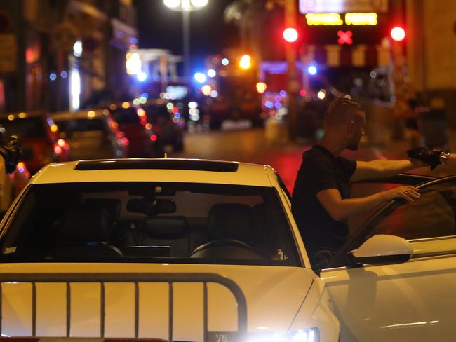 Police officers carry out checks on vehicles in the centre of the French Riviera town of Nice. Picture: Valery Hache