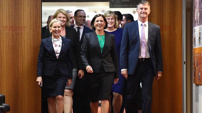 Ros Bates (left) and Tim Mander with leader Deb Frecklington — pushing child safety reforms. (AAP Image/Dan Peled)